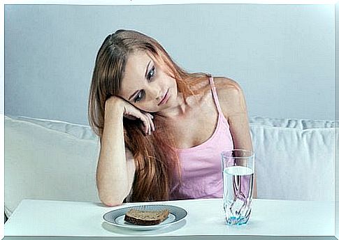 Young woman hanging over the food