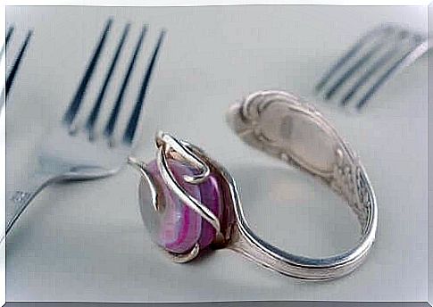 You can make a beautiful napkin ring by bending a fork.  It's just a matter of unleashing your boundless creativity