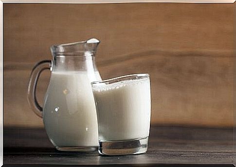 Glass and jug with milk