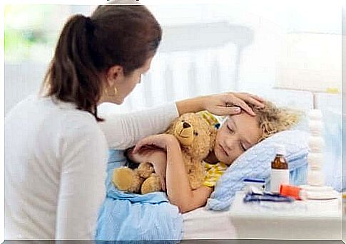 Sick child is cared for by woman