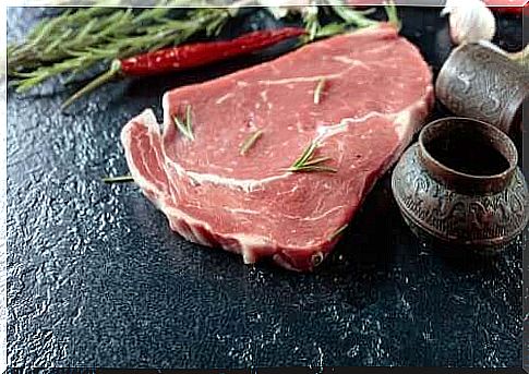 Raw meat on cutting board