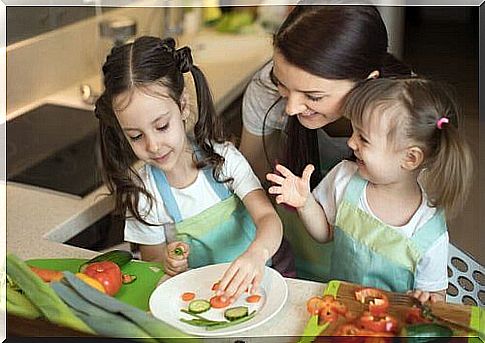 children cooking with their mother