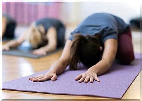 Woman practices yoga