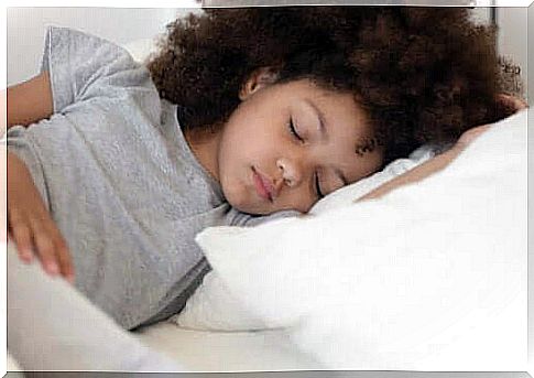 Girl sleeping in bed