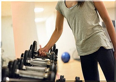 Woman with dumbbells