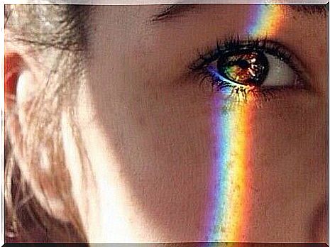 Rainbow in woman's eyes